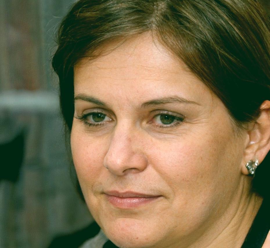 Styling instructor reviewing garments for a photoshoot